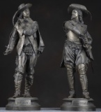 Pair of vintage Spelter Statues, one is marked 