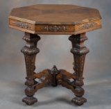 Ornate American, octagon shaped Lamp Table, circa 1920s, with pie shaped burl walnut top, beautifull