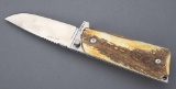 Custom Drop-Point Folder by Ultimate Equipment, solid steel positive lock, stag horn scales in the M