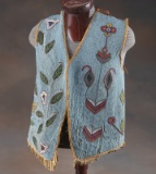 Early full beaded Vest with fringe border, fragile condition with some bead and fringe loss.  Even w