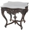 An elaborate Civil War Period, marble top Parlor Table, circa 1860-1865, extremely ornate with carve