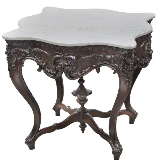 An elaborate Civil War Period, marble top Parlor Table, circa 1860-1865, extremely ornate with carve