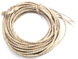 Hand braided Reata with rawhide hondo, measures 66 1/2 ft. long, very good condition.