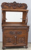Beautiful two piece, antique Sears & Roebuck, quarter sawn oak Sideboard with ornate carved front an