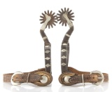 Pair of unmarked iron single mounted Spurs, with silver overlay gal legs, and overlaid silver diamon