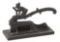 Antique cast iron Tobacco Cutter, with Leprechaun riding a Dolphin on handle, still has the cutter b