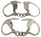 Two pairs of early Hand Cuffs, one pair is marked 