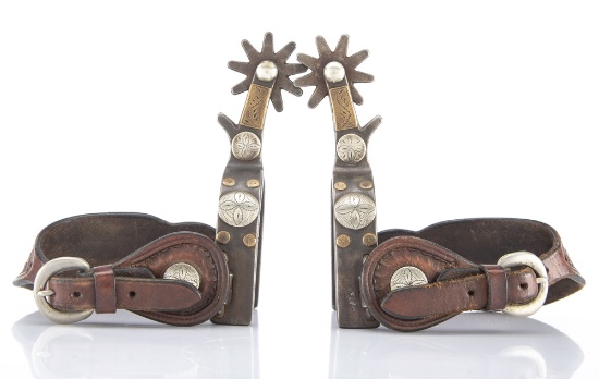 Unusual pair of single mounted Spurs by noted Colorado Bit and Spur Maker Bill Adamson, mounted with