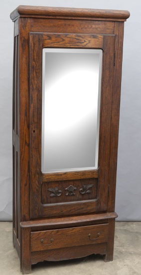 Antique single door, oak Wardrobe, circa 1900-1910, with beveled mirror door with carved panel, step