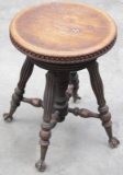 Fancy antique, adjustable Piano Stool with Tiffany Style glass ball and claw feet, estate original,