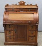 Early oak and walnut, barrel roll Cylinder Desk, circa 1890s, cubby holes behind cylinder with pull