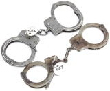 This  consists of two pairs of Hand Cuffs, one pair is marked 