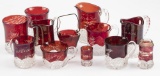 Collection of 12 cranberry to clear early Souvenir Pieces, dating from 1899-1911.  These pieces incl