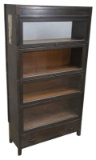 Antique mission oak, four stack Bookcase with drawered base, circa 1910, measures 64