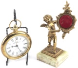 This  consists of two Items to include:  An unusual vintage brass, hanging Alarm Clock made by Seth