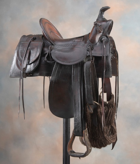 F.A. Meanea Saddle with attached Saddle Bags, saddle is marked "F.A. Meanea / Maker / Cheyenne, W.T.