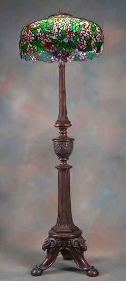 Beautiful antique carved wooden Floor Lamp with footed base and carved rams heads, carved reeded col