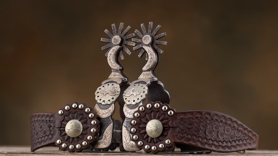 Fine pair of double mounted Spurs by noted Anson, Texas Bit and Spur Maker Danny Pollard, hand engra