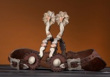 Unique pair of single mounted gal-leg Spurs by noted Austin, Texas Bit and Spur Maker, the late Walt