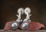 Showy pair of beautifully engraved single mounted Spurs marked 