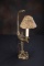Most unusual antique brass, Table Lamp with turkey foot base and ornate fil