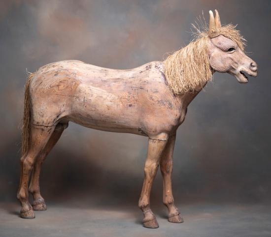 Very unique, early hand carved wooden Pony with straw mane and tail. Carved