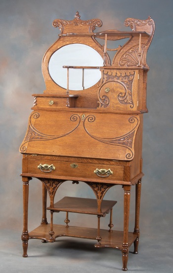 Fancy antique oak, Drop Front Desk, circa 1900s. This style desk was nickna
