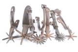 Collection of seven iron Mexican Single Spurs, two with silver inlay, one w