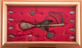 Framed collection of Artifacts in shadow box frame that measures 34 1/2
