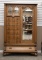Extremely fine antique quarter sawn oak, claw foot Gentleman's Wardrobe, attributed to Karges, circa
