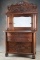 Antique Sears & Roebuck style high back oak Sideboard with ornate crest and beveled mirror top, orna