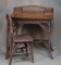 Antique Wicker Writing Desk with quarter sawn oak top, circa 1900-1910, measuring 30