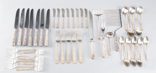 S. Kirk & Sons Sterling Flatware in Repousse Pattern (47 pieces). Pieces include: 5 Serving Pieces;