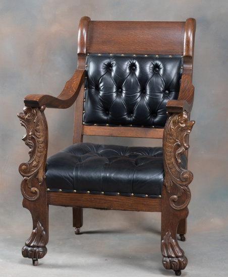 Unique antique quarter sawn oak, claw foot Arm Chair with heavily carved arm supports, circa 1900, v