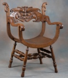 Unique antique bow bottom, quarter sawn oak Arm Chair with carved north wind face on back rest, circ