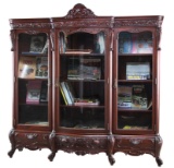 Incredible antique R.J. Horner hand carved triple door Bookcase, with serpentine front and beautiful