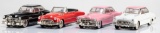 This lot consists of four tin Toy Cars to include: (1) A black Cadillac with red interior and white