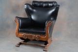 Very unique antique quarter sawn oak claw foot Platform Rocker, with unique and desirable upholstery