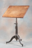 Antique, cast iron base, adjustable wood top Drafting Table, circa 1920-1930, work surface measures