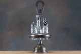 Silver and glass Cruet Set containing five bottles, marked 