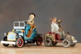 This lot consists of two vintage Tin Toys. (1) A Lehman TUT-TUT tin wind up toy. Toy has bellows to