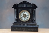 Vintage black wooden German Mantle Clock, with unusual 14 day time and strike movement, very good co