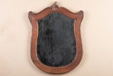 This lot consists of two antique beveled glass mirrors in oak Frames. (1) Diamond shaped mirror that