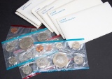 A collection of 15 U.S. Mint U.C. (uncirculated) Coin Sets