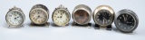 This lot consists of a collection of six vintage miniature Alarm Clocks, some are marked 