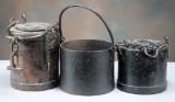 This lot consists of three heavy cast iron Rail Road Grease Pots, two have lids, one is open top, on