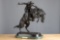 Bronze Western Sculpture with brass label on front titled 