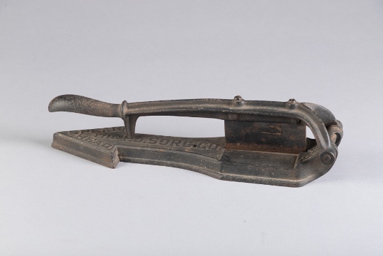 Antique cast iron Tobacco Cutter titled "The Spear Head / P.J. Sorg Co.", original condition.