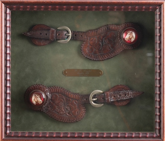 Framed pair of "R.T. Frazier, Pueblo, Colorado" marked two-piece floral Straps with glass horsehead