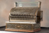 Antique Brass National Cash Register, Model 347, SN 1254716, complete with ornate dust cover, in its